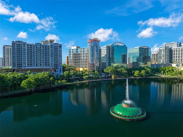 a view of a lake with a city