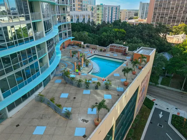 a balcony with an outdoor seating