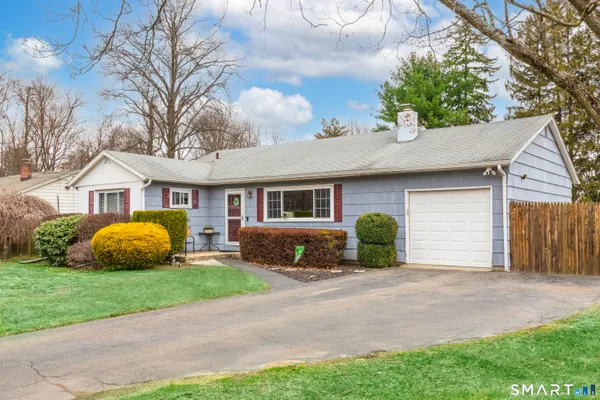 a view of a house with a big yard