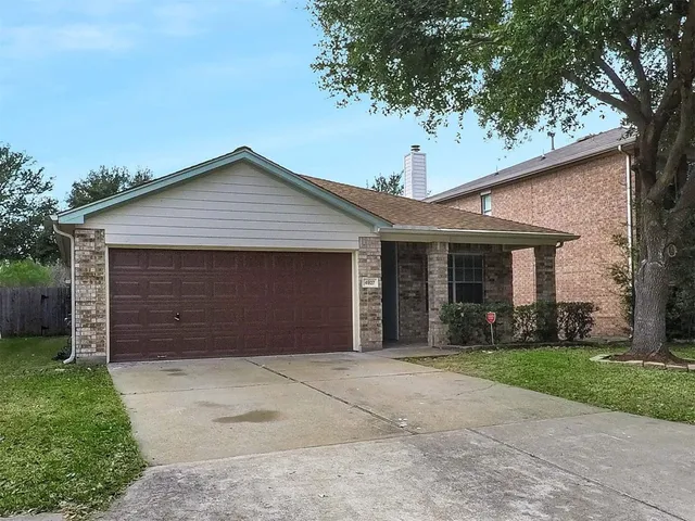a view of a lake with a yard