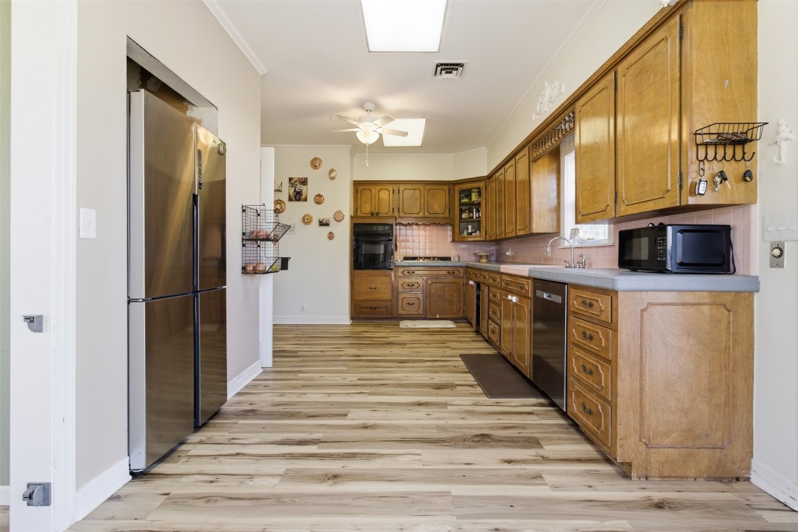 829 Bear Drive Timpson, TX 75975 - Photo 11 of 47 a kitchen with stainless steel appliances granite countertop a refrigerator and a stove