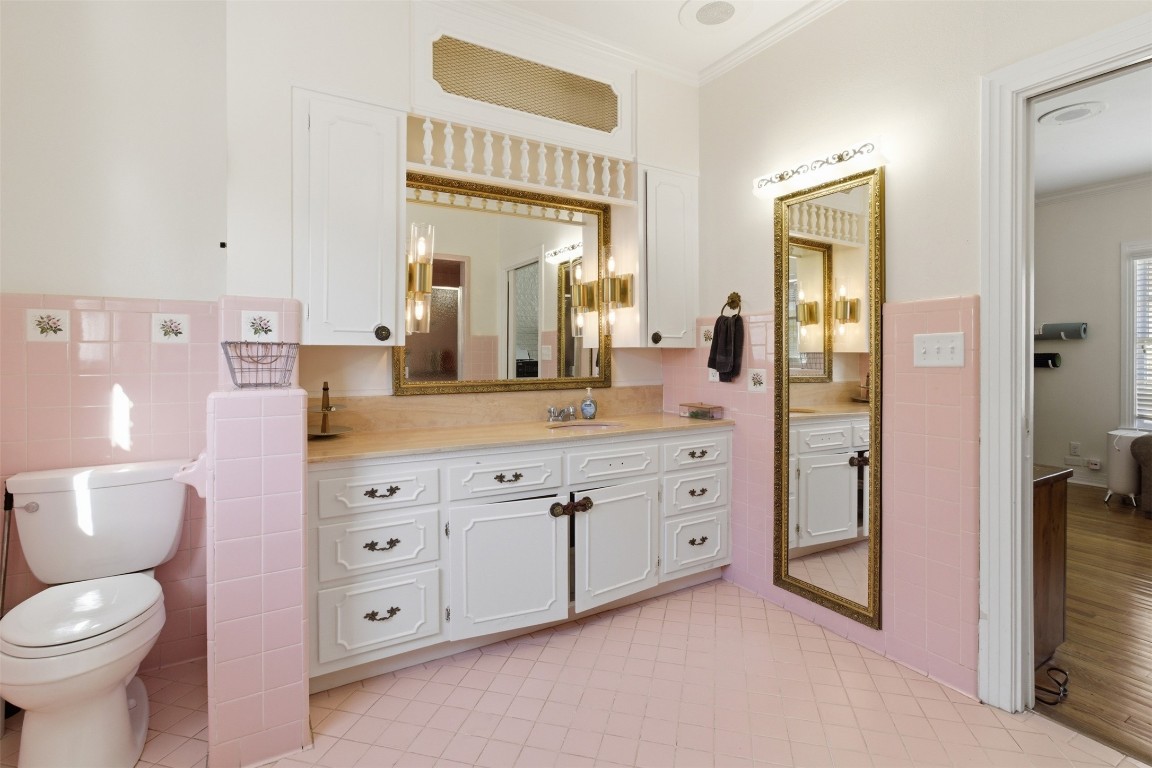 829 Bear Drive Timpson, TX 75975 - Photo 22 of 47 a spacious bathroom with a granite countertop sink mirror and toilet