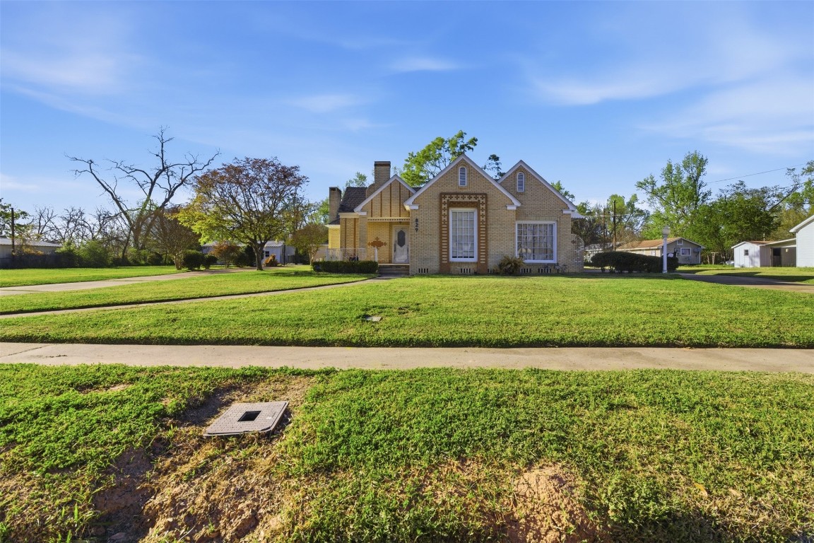 829 Bear Drive Timpson, TX 75975 - Photo 32 of 47 a front view of a house with a yard and garage