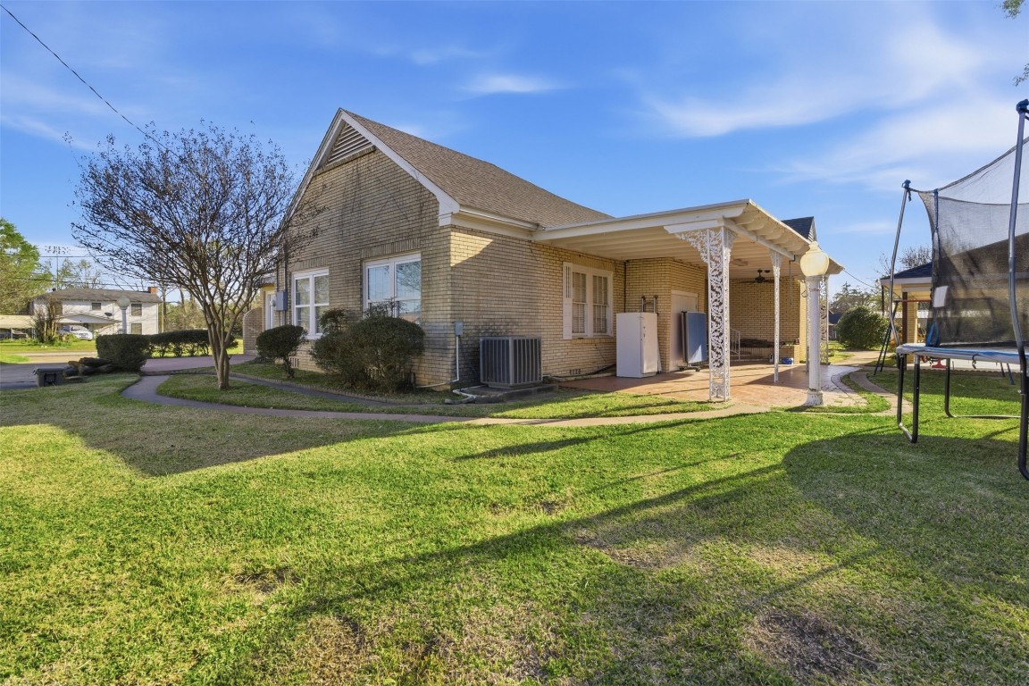829 Bear Drive Timpson, TX 75975 - Photo 35 of 47 a view of a house with a yard