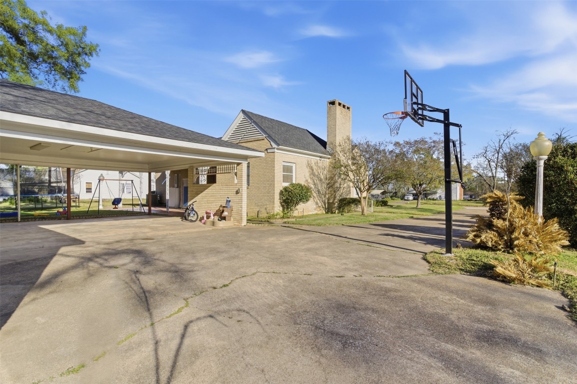829 Bear Drive Timpson, TX 75975 - Photo 39 of 47 a view of a house with basketball court