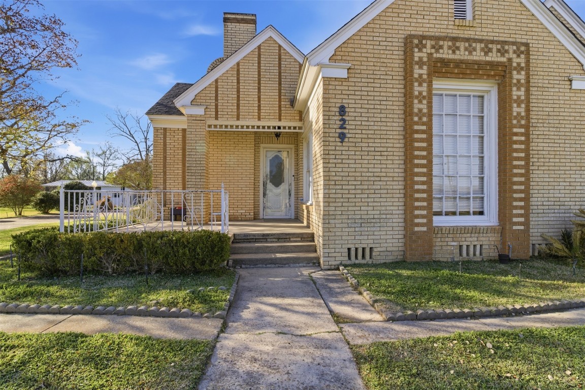 829 Bear Drive Timpson, TX 75975 - Photo 40 of 47 a front view of a house with garden