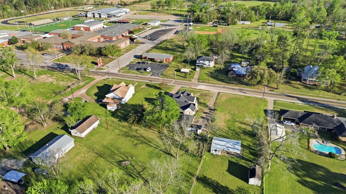 829 Bear Drive Timpson, TX 75975 - Photo 41 of 47 an aerial view of a house with a swimming pool