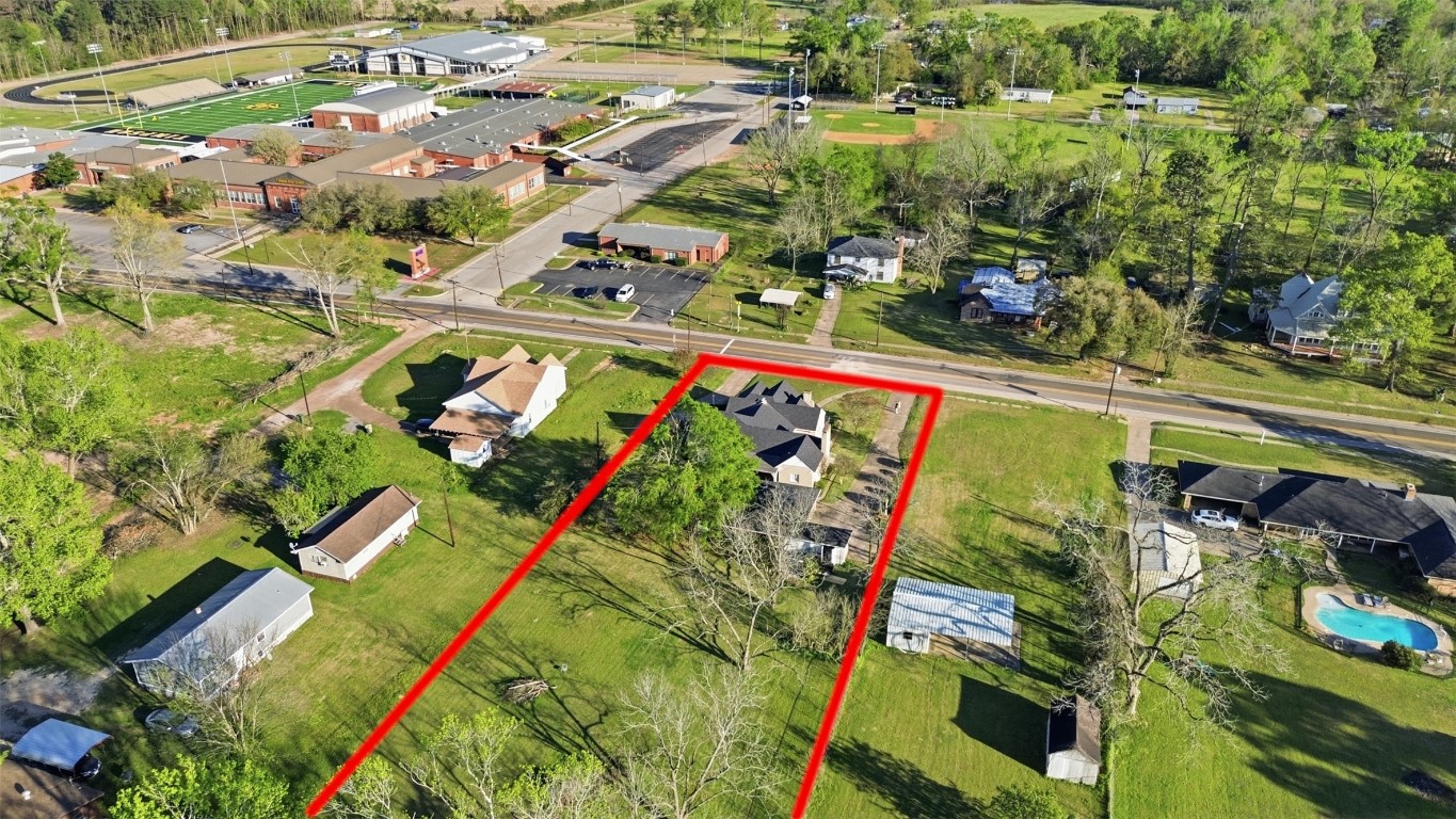 829 Bear Drive Timpson, TX 75975 - Photo 46 of 47 an aerial view of a houses with yard