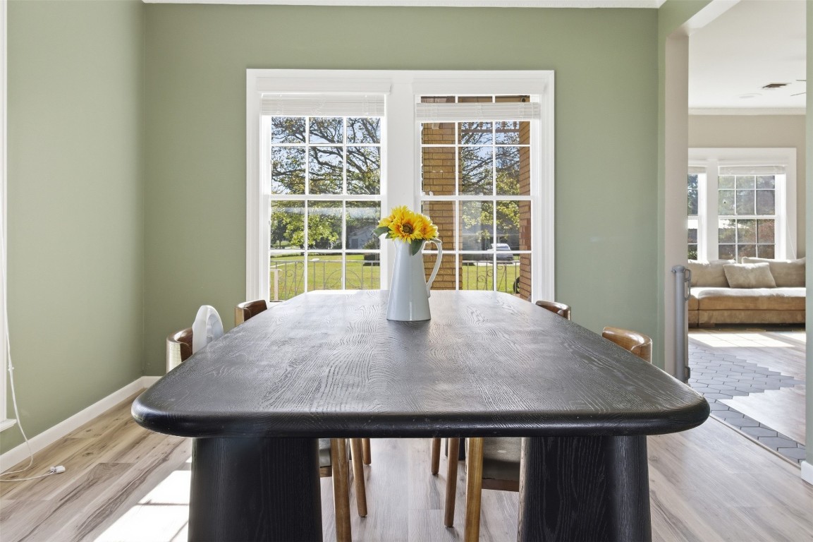829 Bear Drive Timpson, TX 75975 - Photo 7 of 47 a view of a dining room with furniture and wooden floor