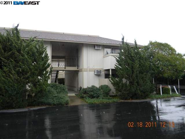 4260 Clayton Road, Unit 64 Concord, CA 94521 - Photo 1 of 1 a front view of a house with a yard