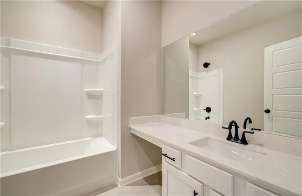 a bathroom with a sink and a bathtub