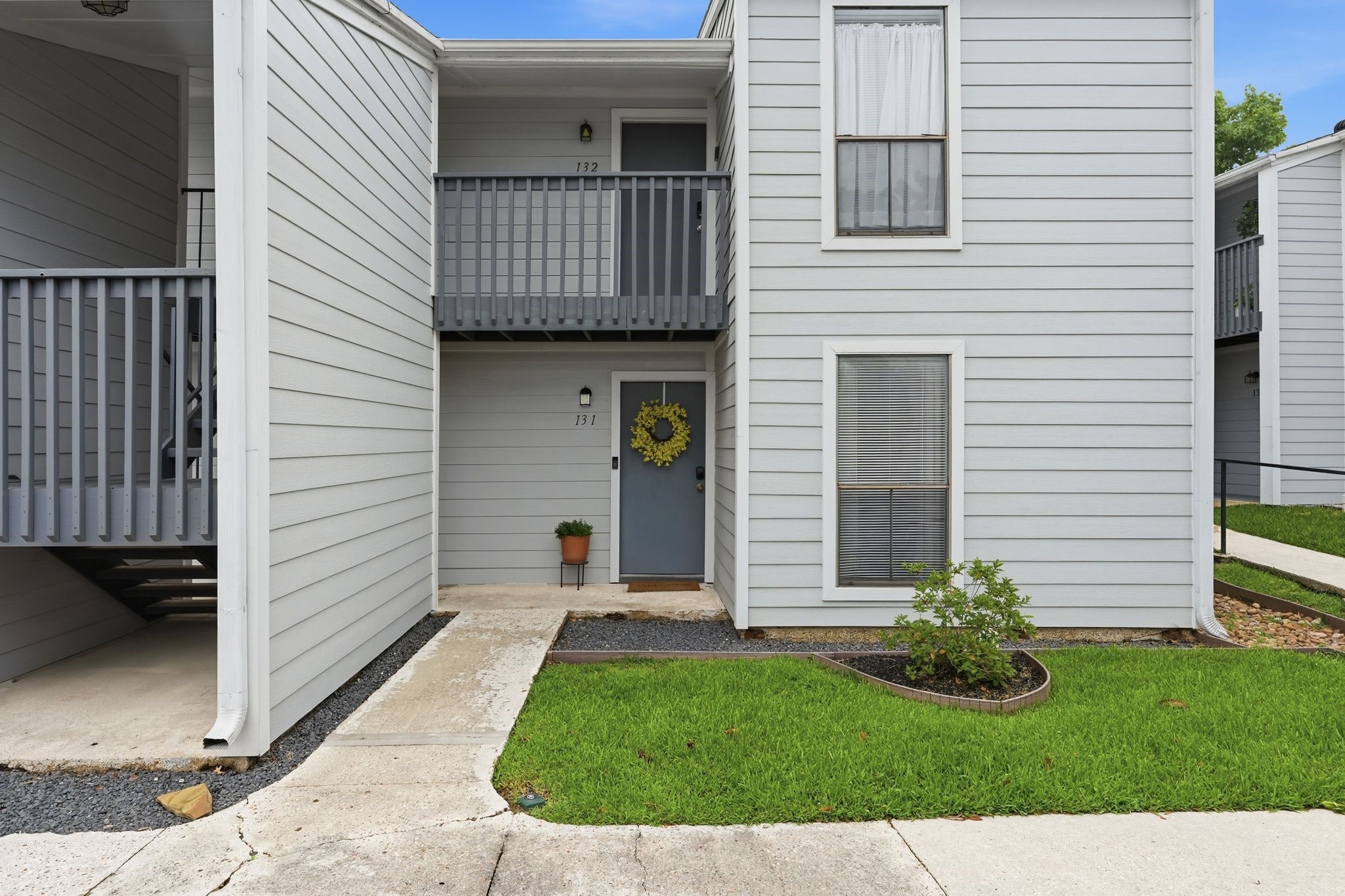 13151 Walden Road, Unit 131 Montgomery, TX 77356 - Photo 23 of 35 Welcoming front entrance with a private covered entry and charming curb appeal.