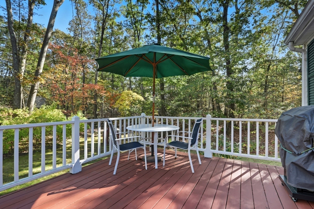 2 Glenwood Road Andover, MA 01810 - Photo 15 of 42 a view of a chair and table on the deck