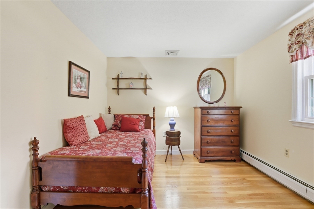 2 Glenwood Road Andover, MA 01810 - Photo 25 of 42 a bedroom with a bed closet and window