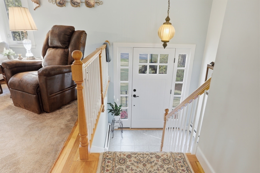 2 Glenwood Road Andover, MA 01810 - Photo 27 of 42 a living room with furniture and wooden floor