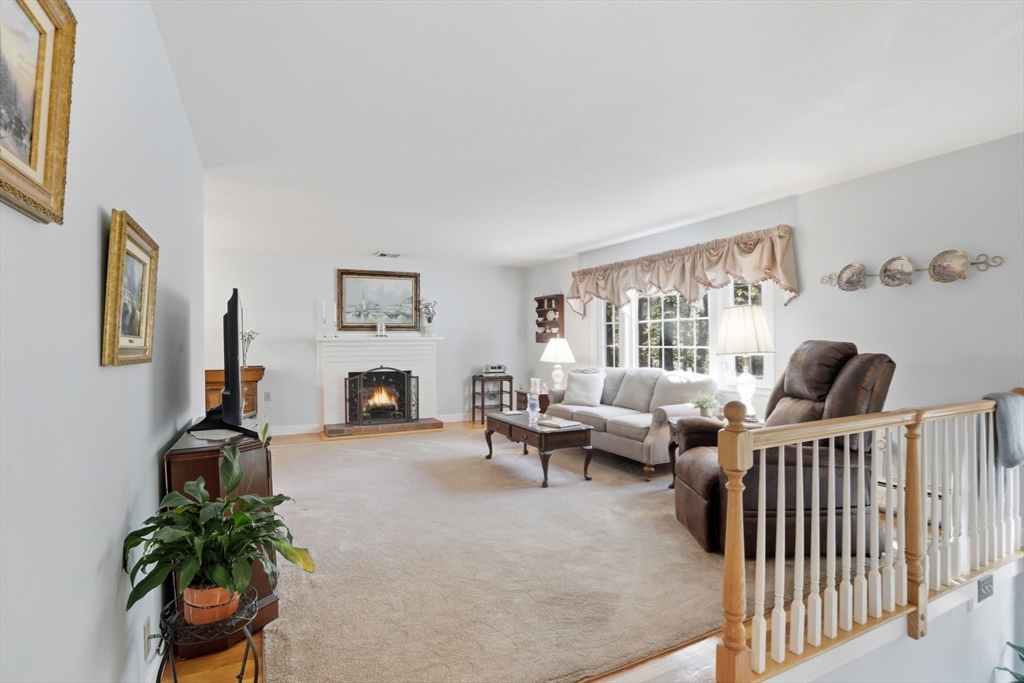 2 Glenwood Road Andover, MA 01810 - Photo 5 of 42 a living room with furniture and a fireplace