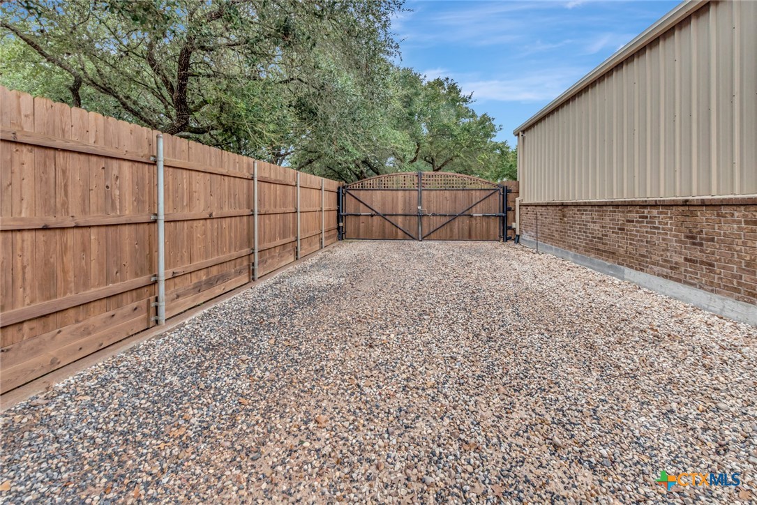 249 Post Oak Bend Inez, TX 77968 - Photo 31 of 36 a backyard of a house with lots of green space