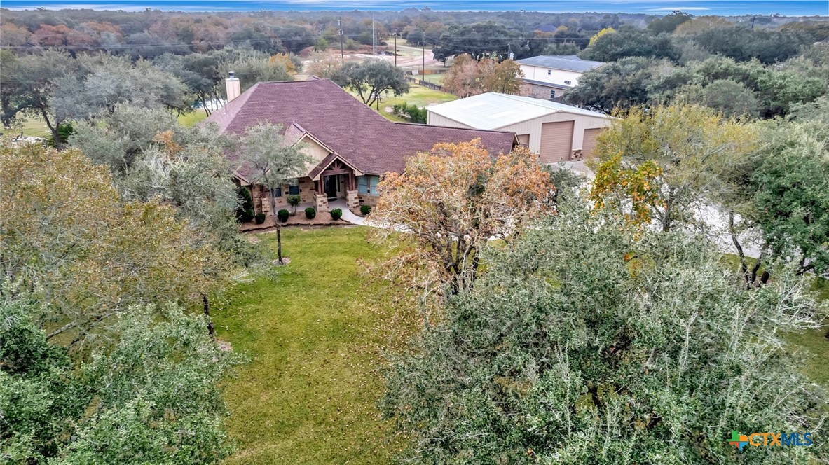 249 Post Oak Bend Inez, TX 77968 - Photo 35 of 36 an aerial view of residential houses with outdoor space and trees