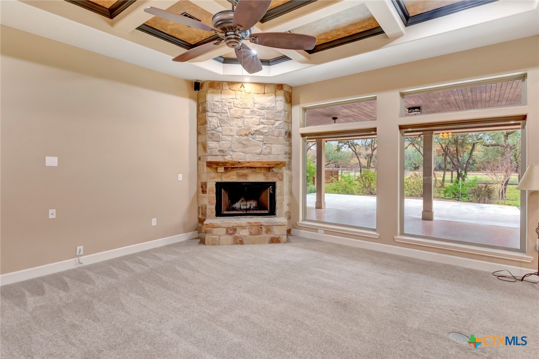 249 Post Oak Bend Inez, TX 77968 - Photo 7 of 36 a view of an empty room with a fireplace and a window