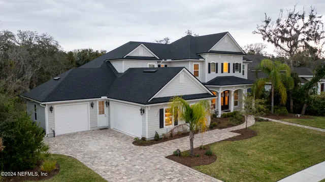 a living room with fireplace furniture and a flat screen tv