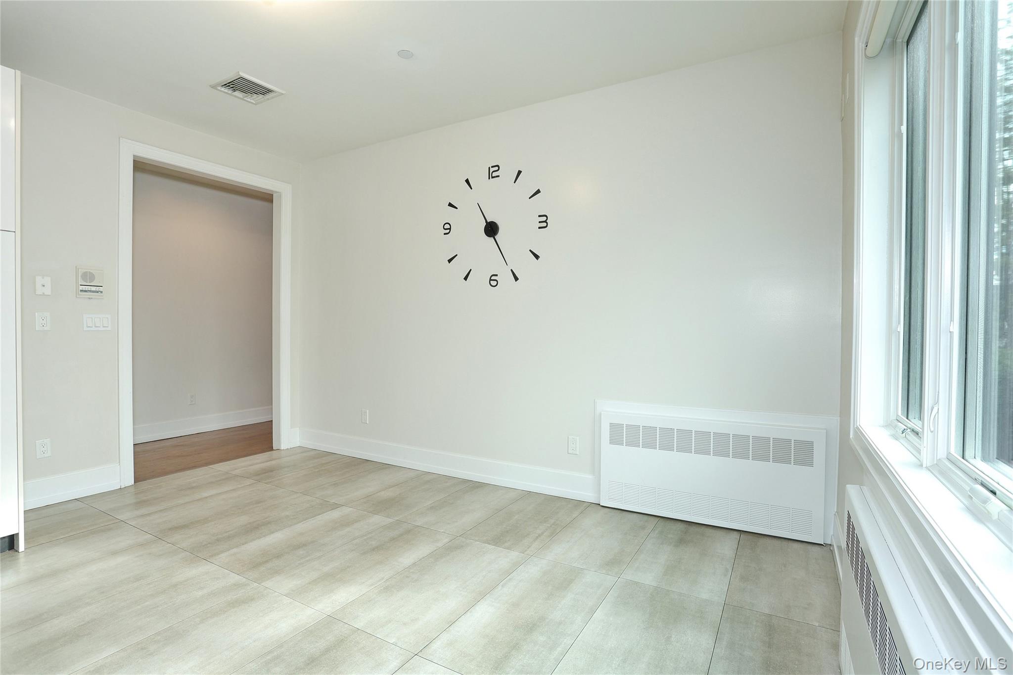 8 Neil Road, Unit 213 Spring Valley, NY 10977 - Photo 12 of 50 an empty room with a window