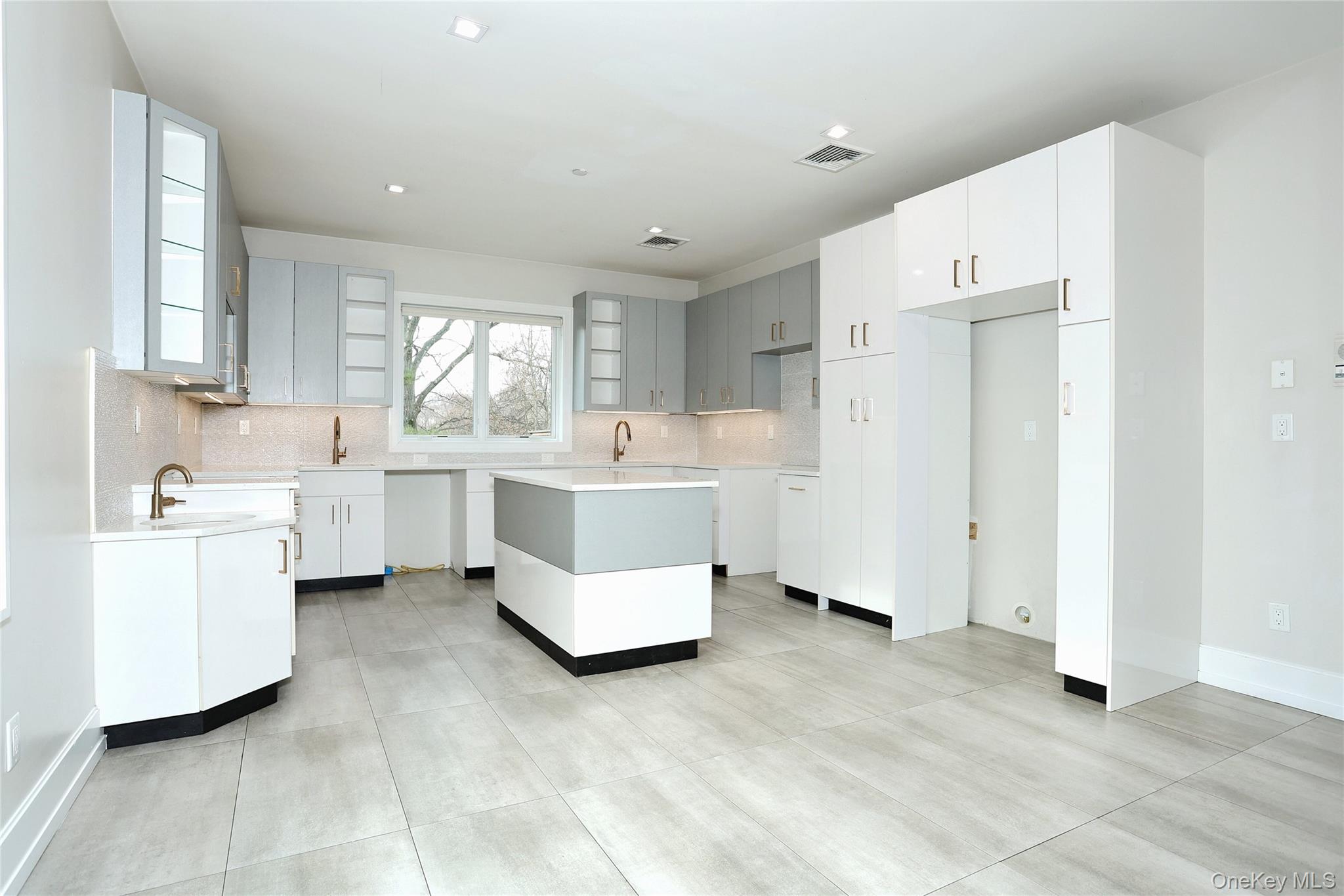 8 Neil Road, Unit 213 Spring Valley, NY 10977 - Photo 14 of 50 a large white room with a white bed desk and chair