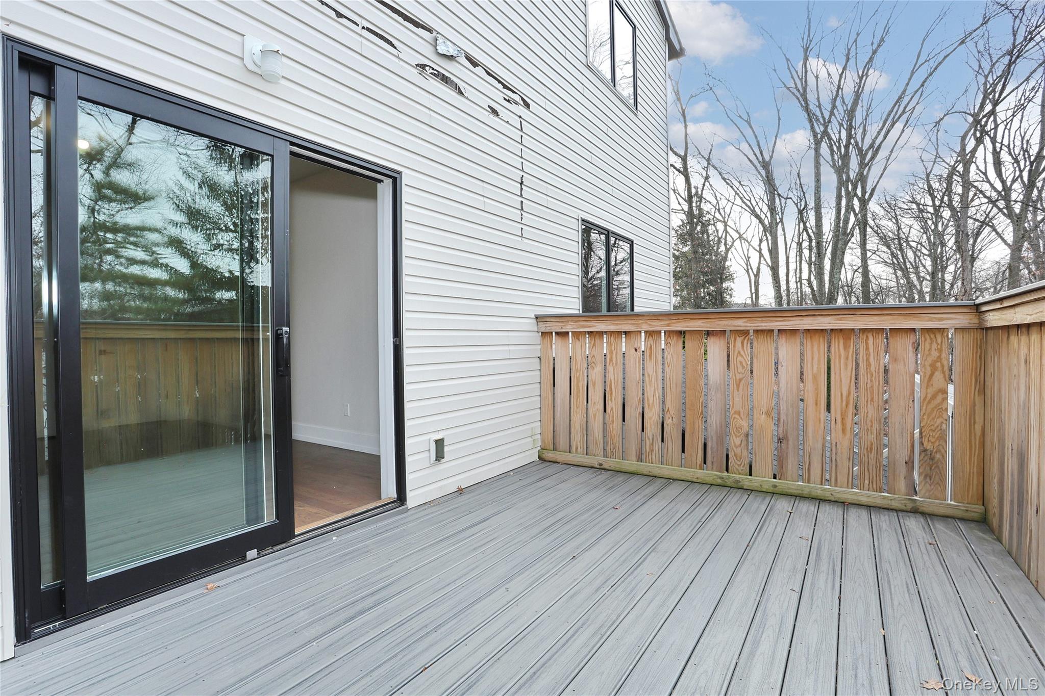 8 Neil Road, Unit 213 Spring Valley, NY 10977 - Photo 20 of 50 a view of a wooden deck