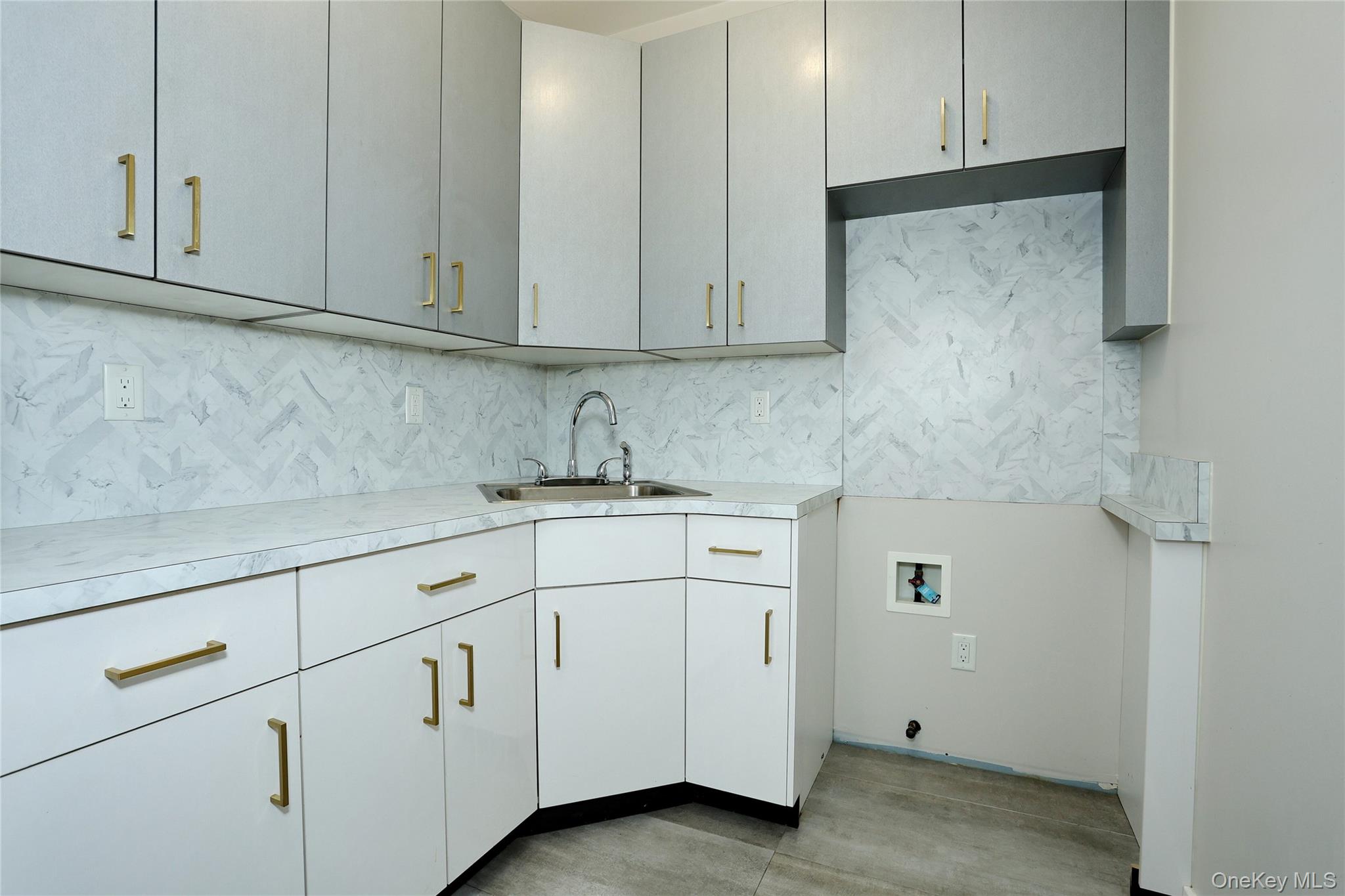 8 Neil Road, Unit 213 Spring Valley, NY 10977 - Photo 23 of 50 a kitchen with white cabinets