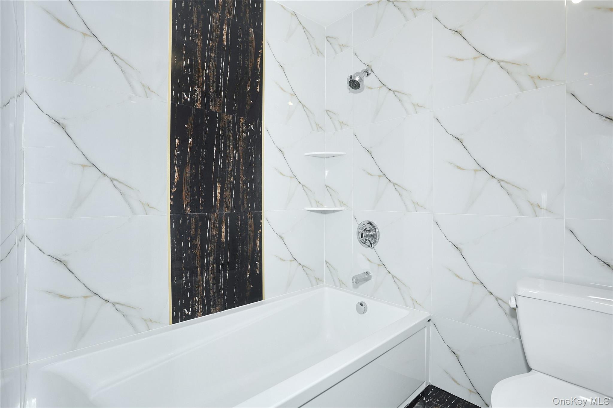 8 Neil Road, Unit 213 Spring Valley, NY 10977 - Photo 29 of 50 a bathroom with a bathtub and shower