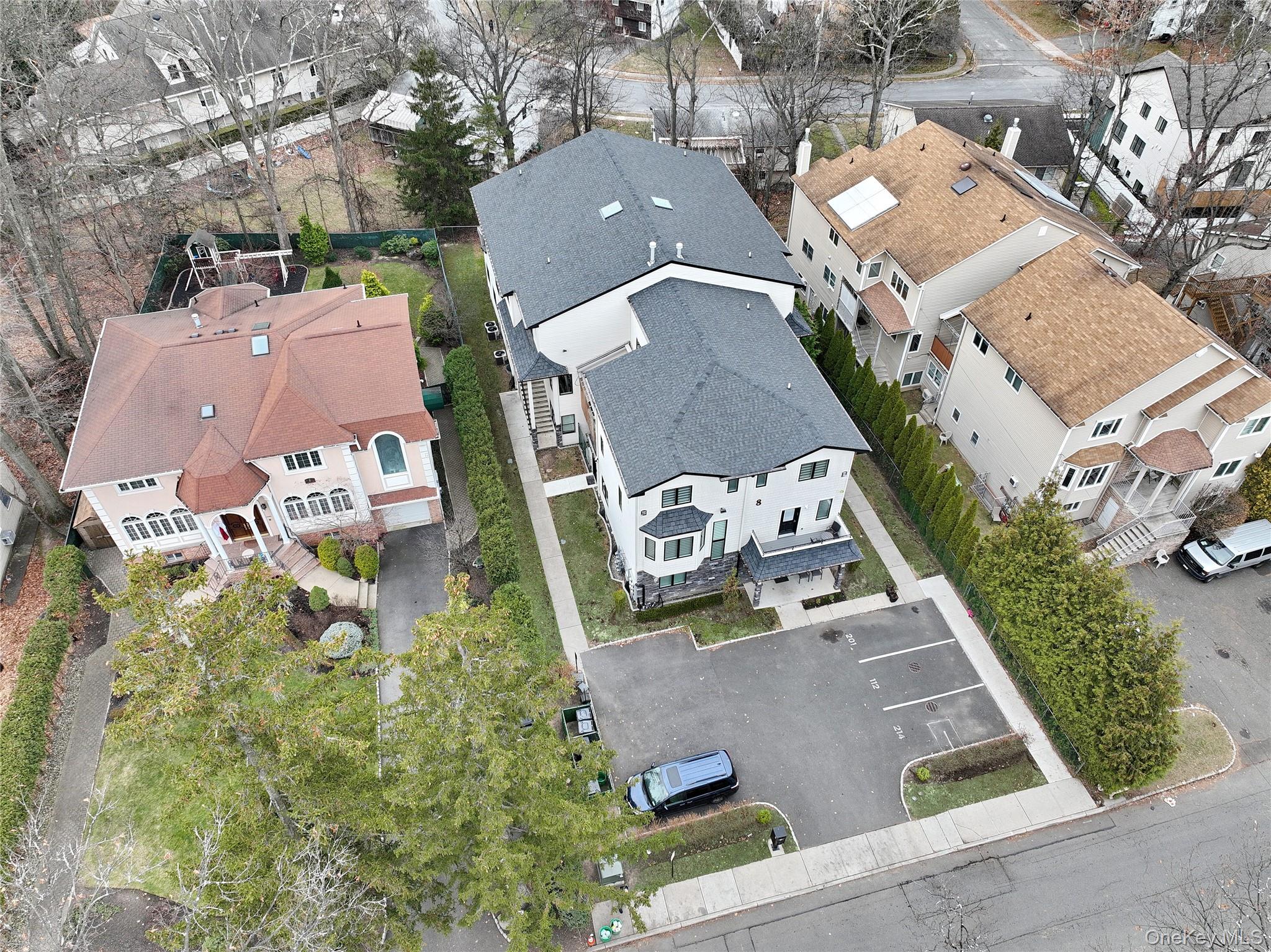8 Neil Road, Unit 213 Spring Valley, NY 10977 - Photo 45 of 50 an aerial view of residential houses with outdoor space