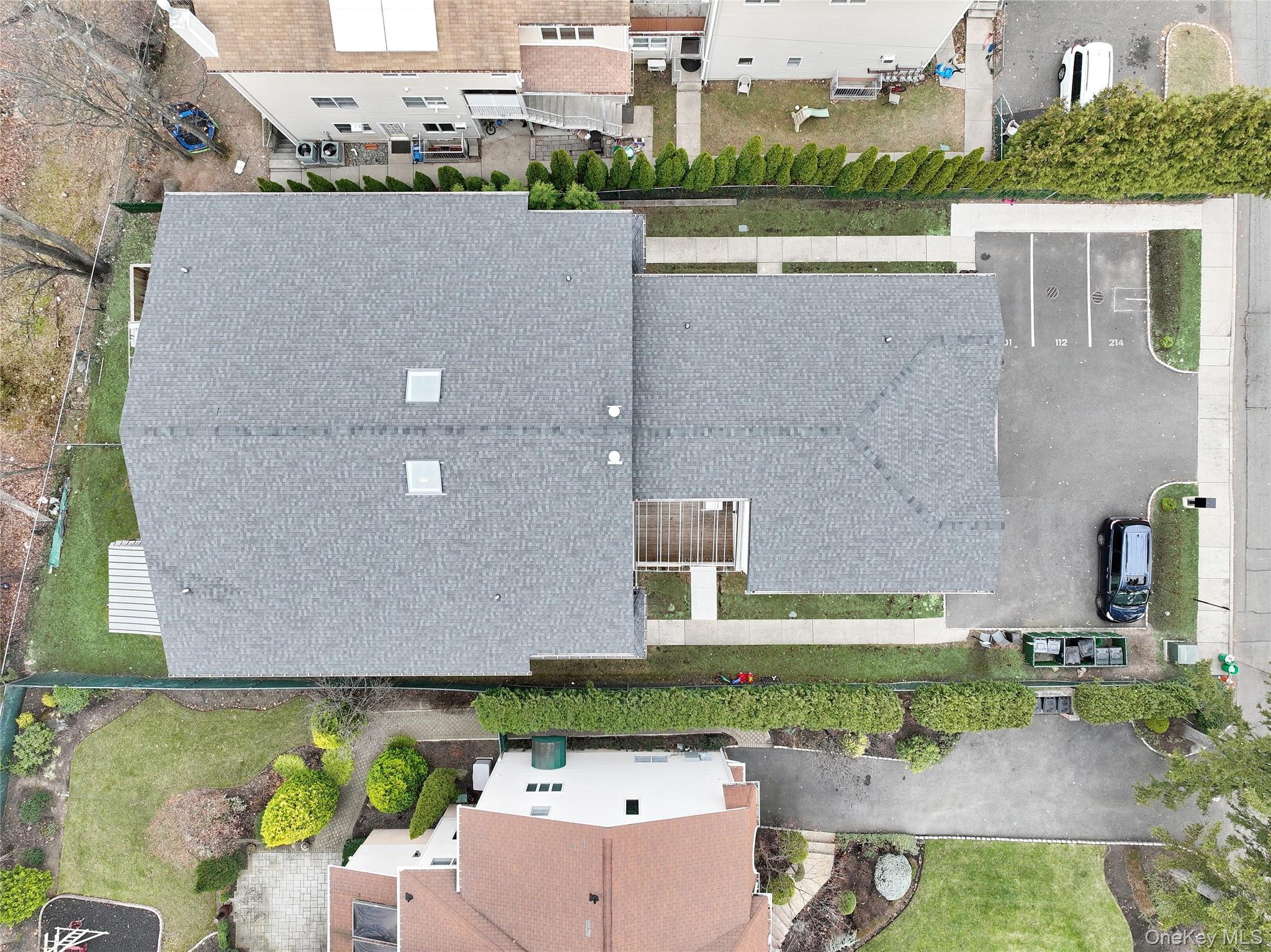 8 Neil Road, Unit 213 Spring Valley, NY 10977 - Photo 49 of 50 an aerial view of a house with a garden and lake view