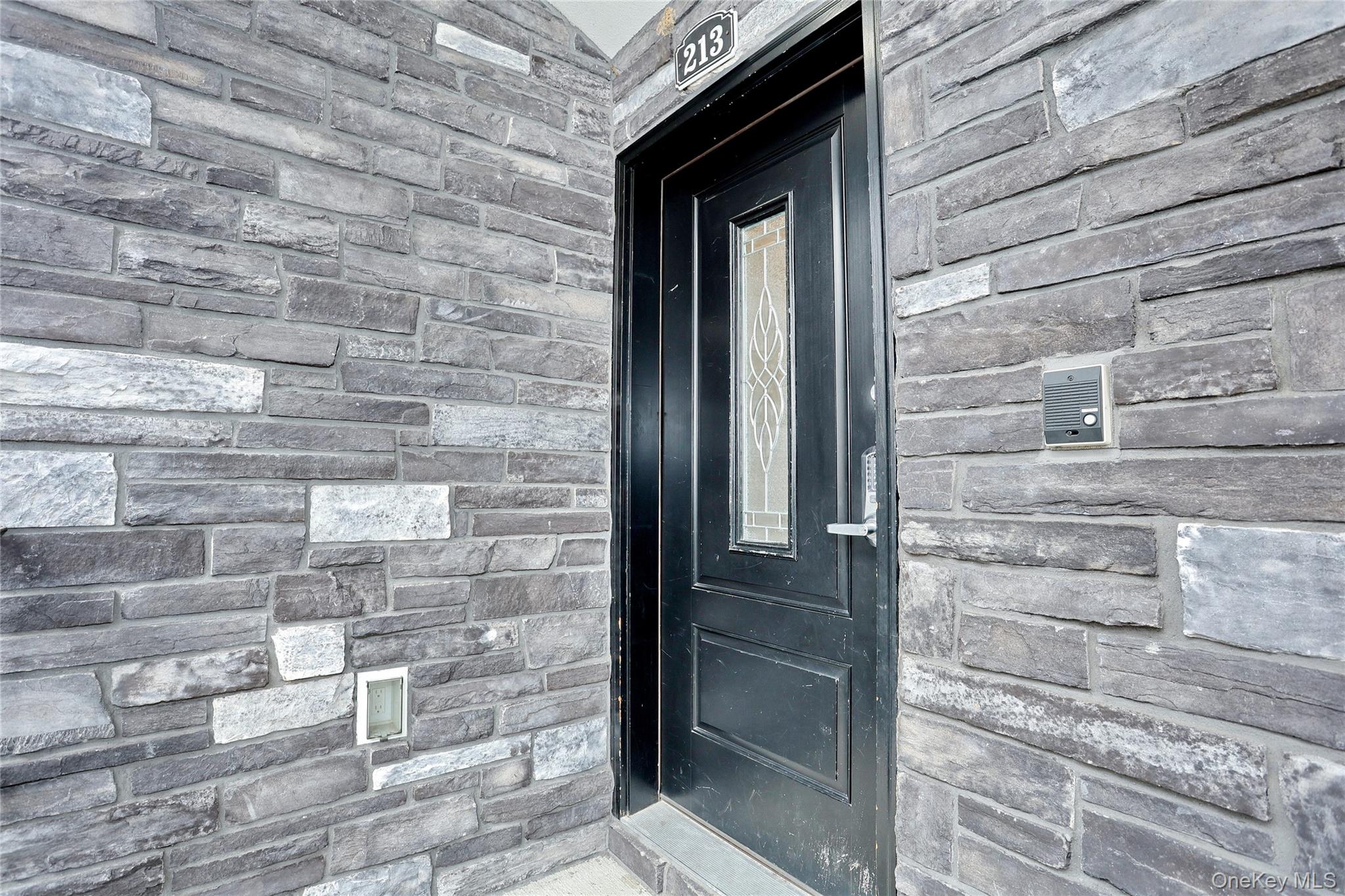 8 Neil Road, Unit 213 Spring Valley, NY 10977 - Photo 5 of 50 a brick house with a door