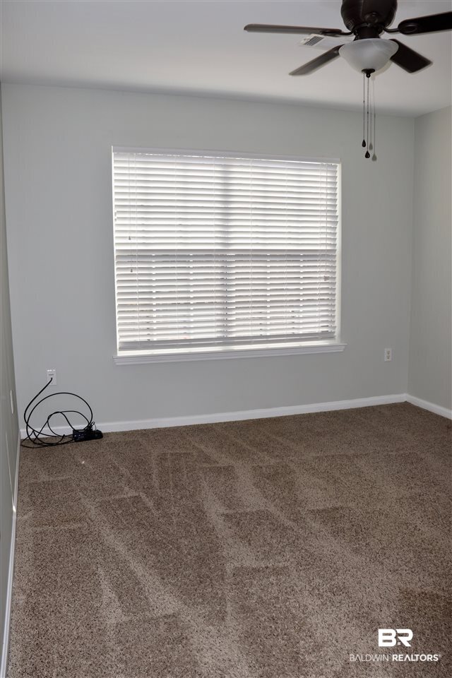 1517 Regency Road, Unit 122 Gulf Shores, AL 36542 - Photo 31 of 37 Master Bedroom