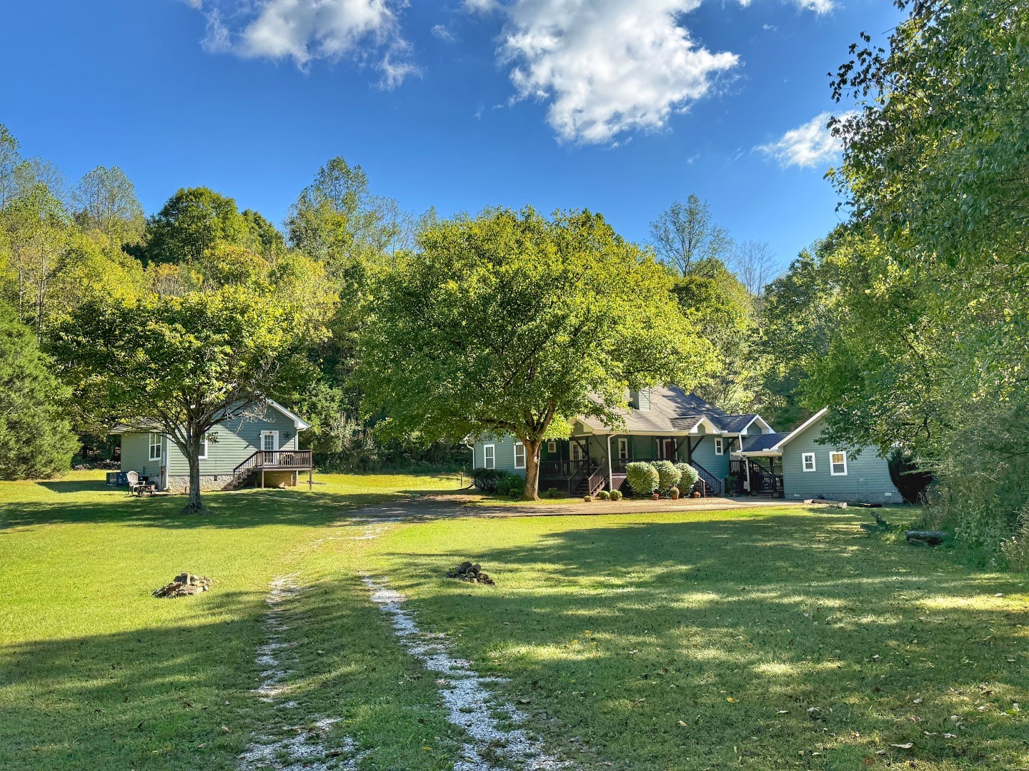 1381 Turkey Creek Road Dickson, TN 37055 - Photo 3 of 35 a view of a swimming pool with an outdoor space and seating area