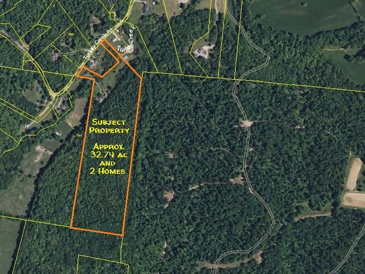 1381 Turkey Creek Road Dickson, TN 37055 - Photo 31 of 35 a sign that is on the side of a tree