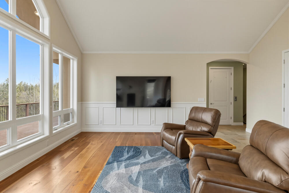 6586 Cooper's Hawk Road Klamath Falls, OR 97601 - Photo 9 of 68 a living room with furniture and a flat screen tv