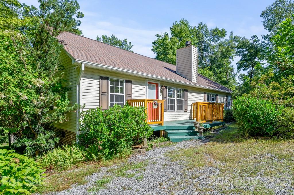 151 Butternut Lane Rutherfordton, NC 28139 - Photo 1 of 24 a front view of house with a garden