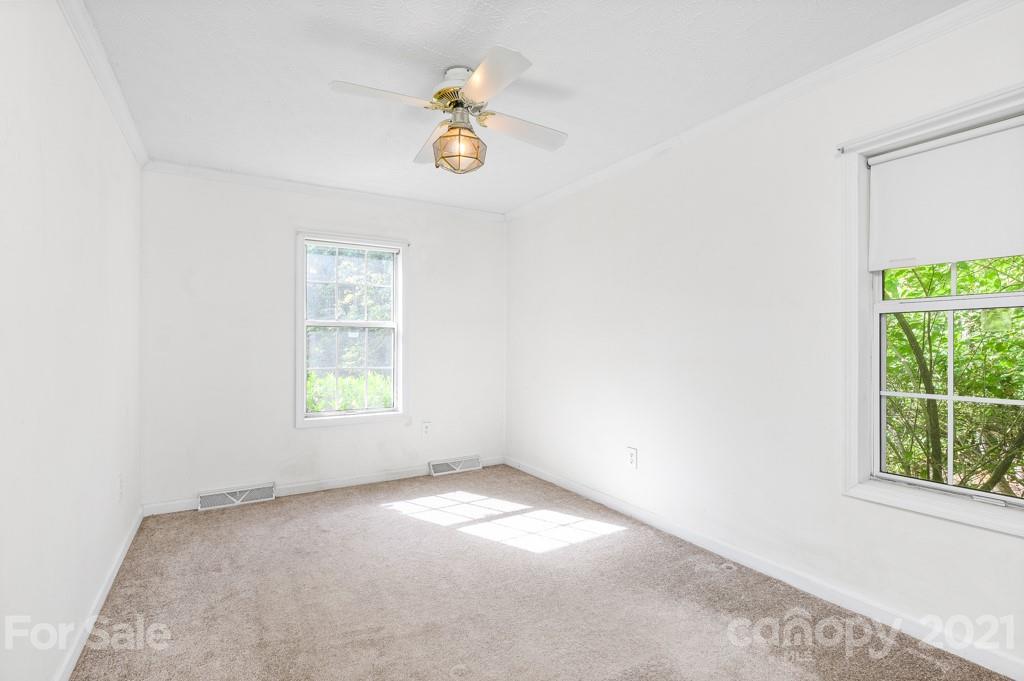 151 Butternut Lane Rutherfordton, NC 28139 - Photo 14 of 24 an empty room with windows