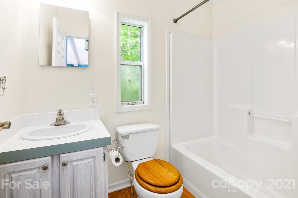 151 Butternut Lane Rutherfordton, NC 28139 - Photo 15 of 24 a bathroom with a sink a toilet and a bathtub
