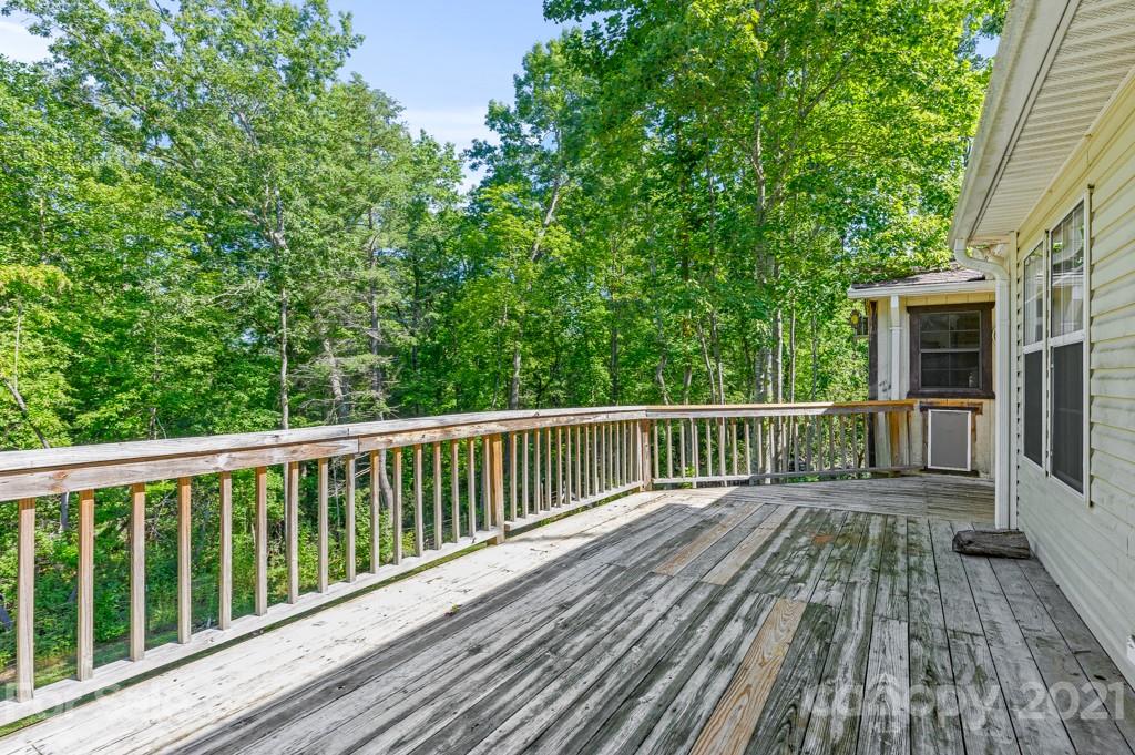 151 Butternut Lane Rutherfordton, NC 28139 - Photo 18 of 24 a balcony with wooden floor and fence