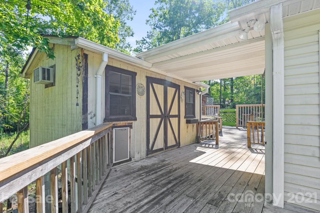 151 Butternut Lane Rutherfordton, NC 28139 - Photo 20 of 24 a view of balcony with wooden floor and seating space