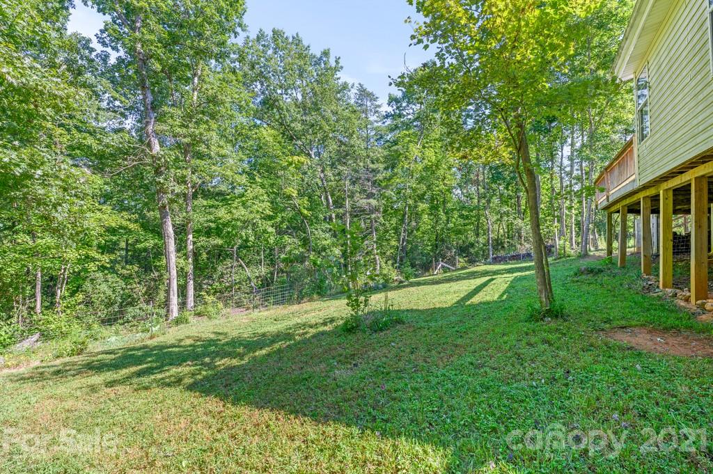 151 Butternut Lane Rutherfordton, NC 28139 - Photo 23 of 24 a view of a house with a yard