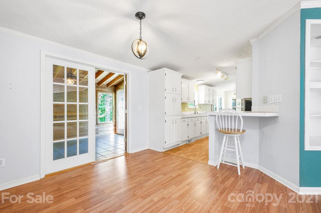 151 Butternut Lane Rutherfordton, NC 28139 - Photo 8 of 24 a view of a room with wooden floor and windows