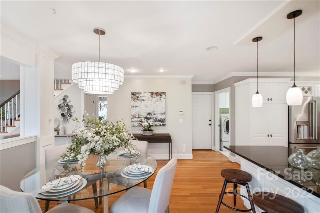 1435 Lilac Road Charlotte, NC 28209 - Photo 14 of 33 a view of a dining room with furniture