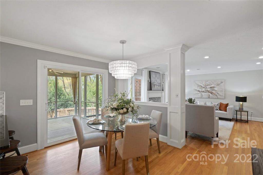 1435 Lilac Road Charlotte, NC 28209 - Photo 15 of 33 a dining room with furniture window wooden floor