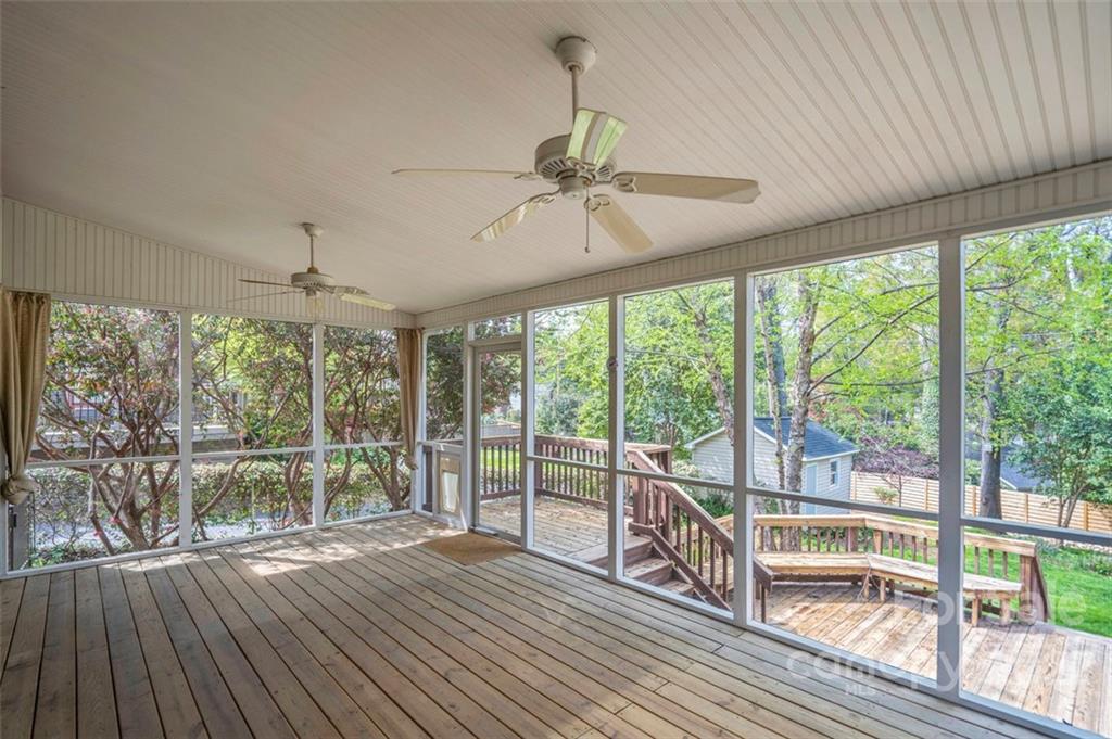 1435 Lilac Road Charlotte, NC 28209 - Photo 28 of 33 a view of a room with wooden floor and balcony