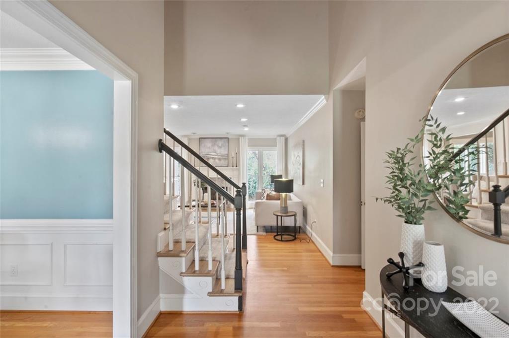 1435 Lilac Road Charlotte, NC 28209 - Photo 5 of 33 a view of entryway with livingroom and wooden floor