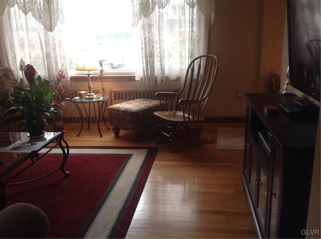 56 Ridgewood Road Easton, PA 18045 - Photo 11 of 19 a living room with furniture rug and a flat screen tv