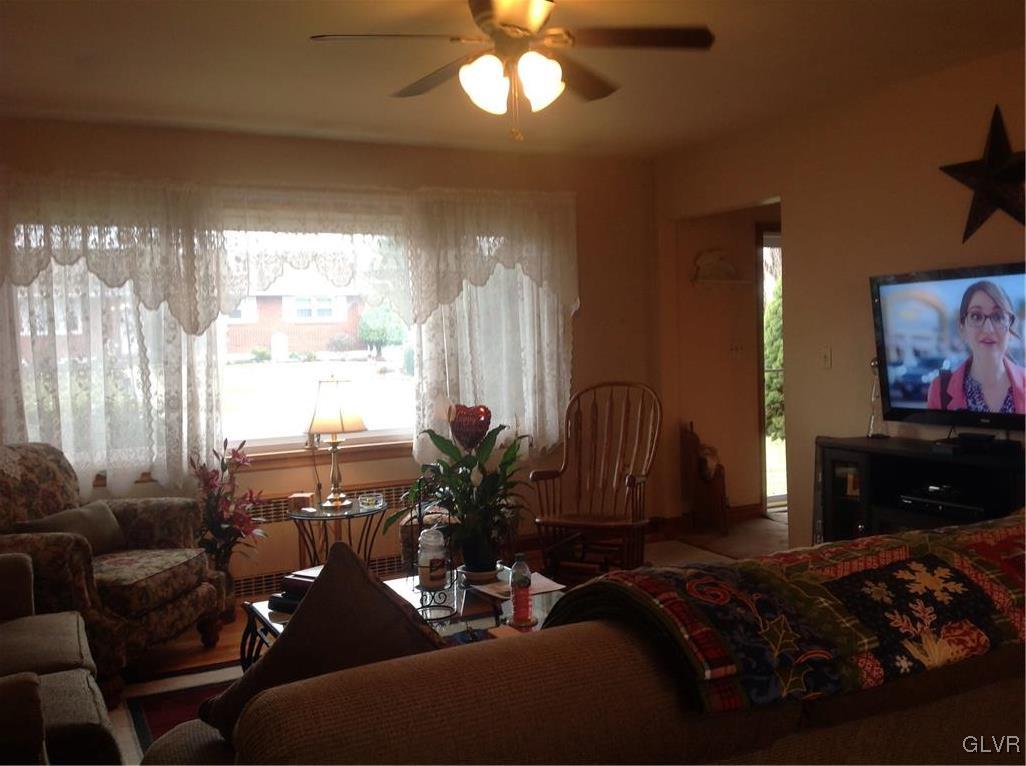 56 Ridgewood Road Easton, PA 18045 - Photo 5 of 19 a living room with furniture and a flat screen tv