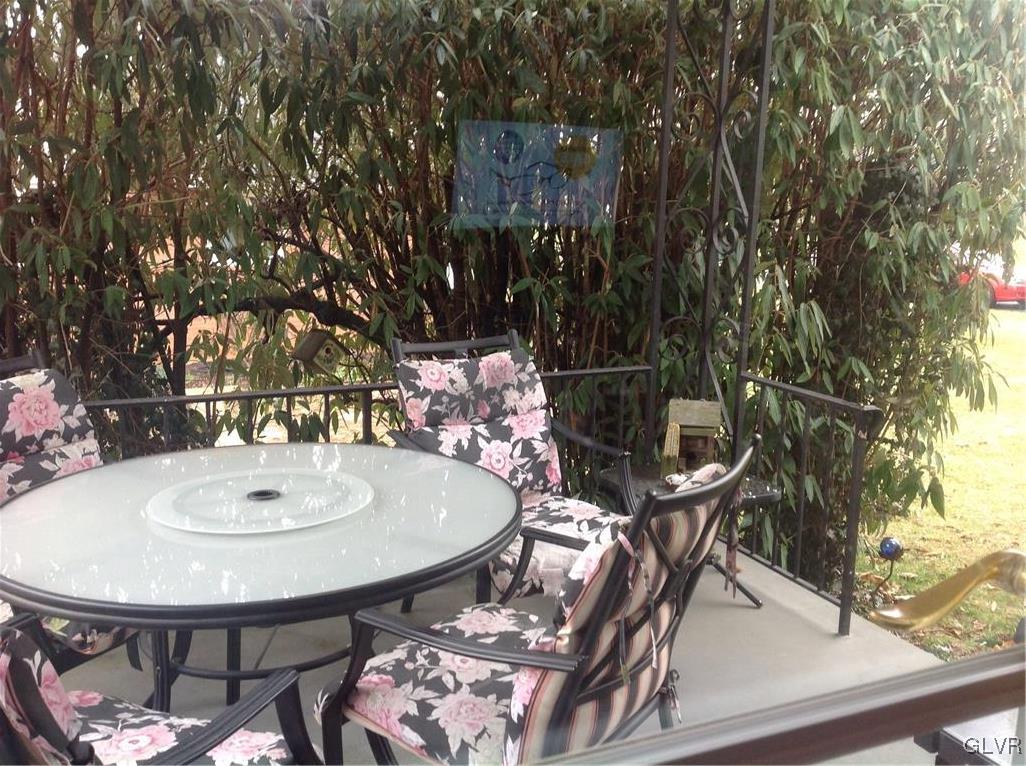 56 Ridgewood Road Easton, PA 18045 - Photo 6 of 19 a outdoor dining space with furniture and umbrella